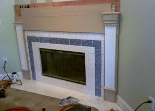 We are putting the custom surround and mantle on the fireplace.