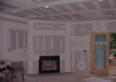 Sheetrock is now finished, the spackle process is important for nice smooth walls.