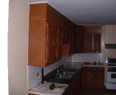 This is what the old kitchen looked like. They were metal cabinets.
