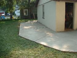 The Owner wanted the patio to go around the attached Garage.